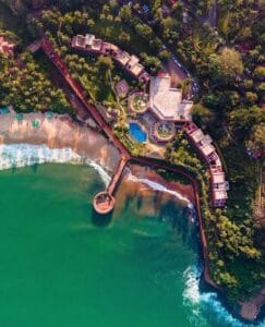 beautiful view of fort aguwada from the top in which the view of blue water and the fort is visible