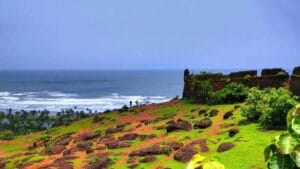 Ruins of chapora fort showing stones and sea water