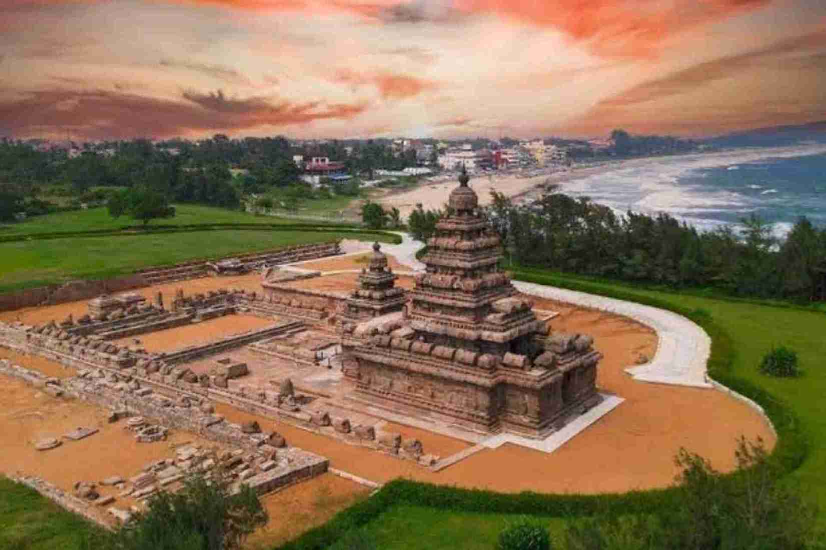 A temple standing on land and greenery across the temple