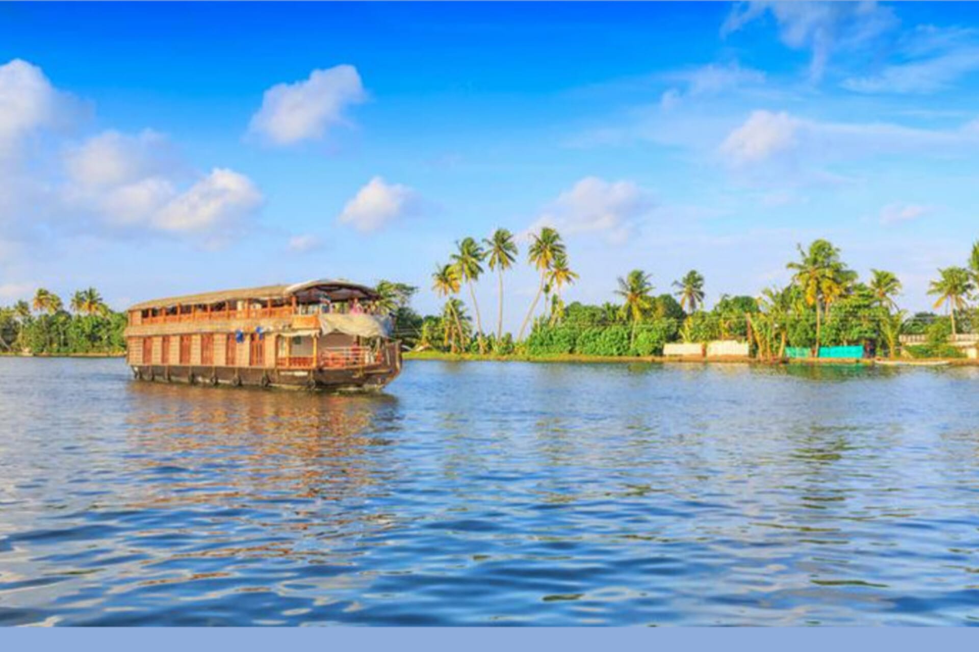 House boat in the lake and some palm trees near side of the sea भारतीय द्वीपों