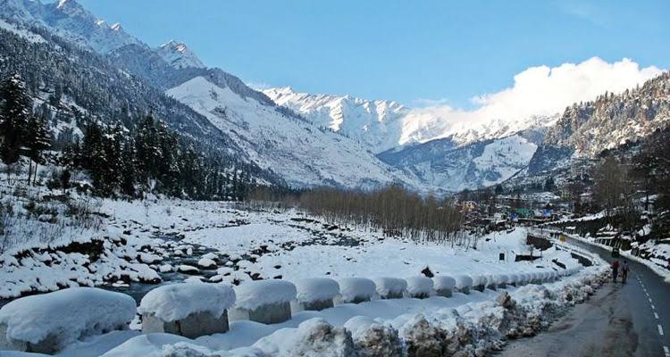there is a snow covered all over the land and mountain which seems like white everywhere