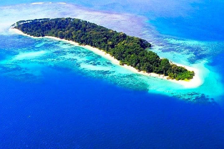 Blue water island nicobar and green color mountain between water Andaman And Nicobar Island Tourism