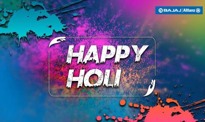 happy Holi is written by the white color Holi festival